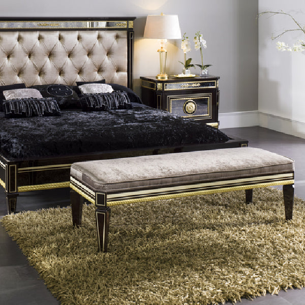 Elegant Upholstered Bench with Gold and Black Accents