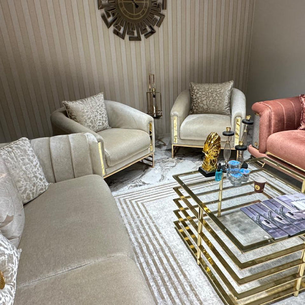 Sumptuous Sofa: Plush upholstery with elegant gold accents