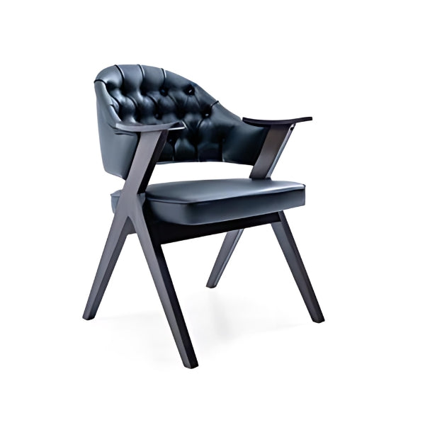 Luxurious Black Tufted Armchair with Dark Wood Frame