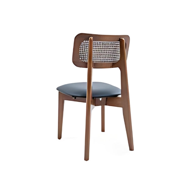 Elegant Black Upholstered Chair with Rattan Back and Walnut Frame