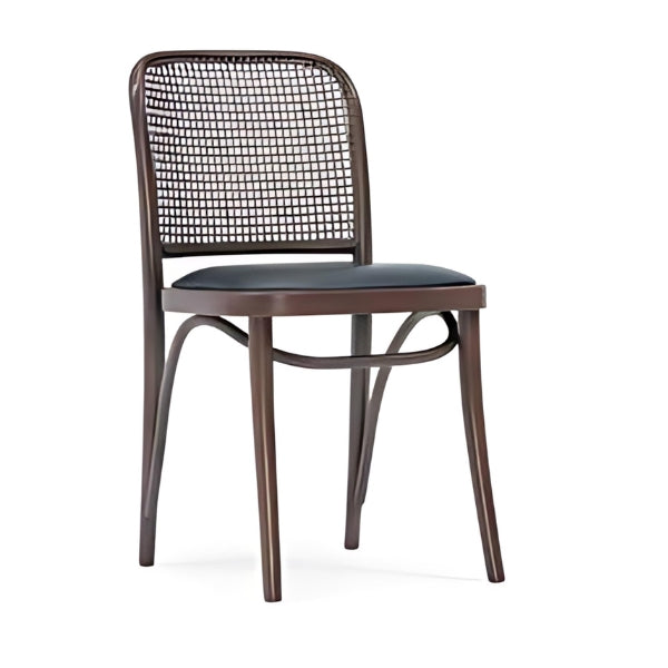 Elegant Black Upholstered Chair with Rattan Back and Dark Wood Frame