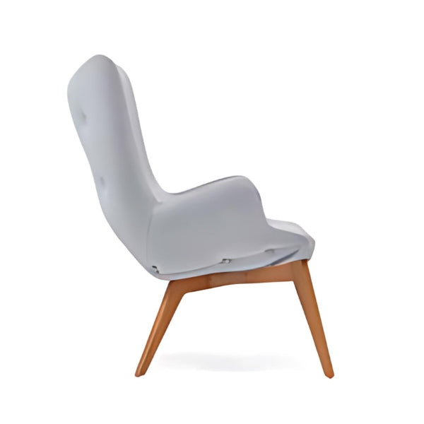 Contemporary Comfort: The Light Gray Tufted Accent Chair with Wooden Legs