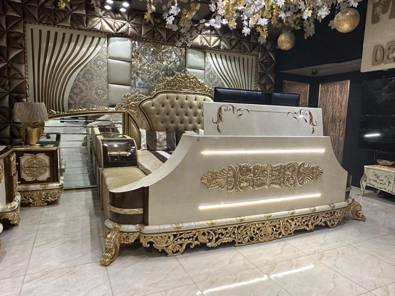 Opulent Royal Bedroom Set with Elegant Upholstery and Ornate Gold Details