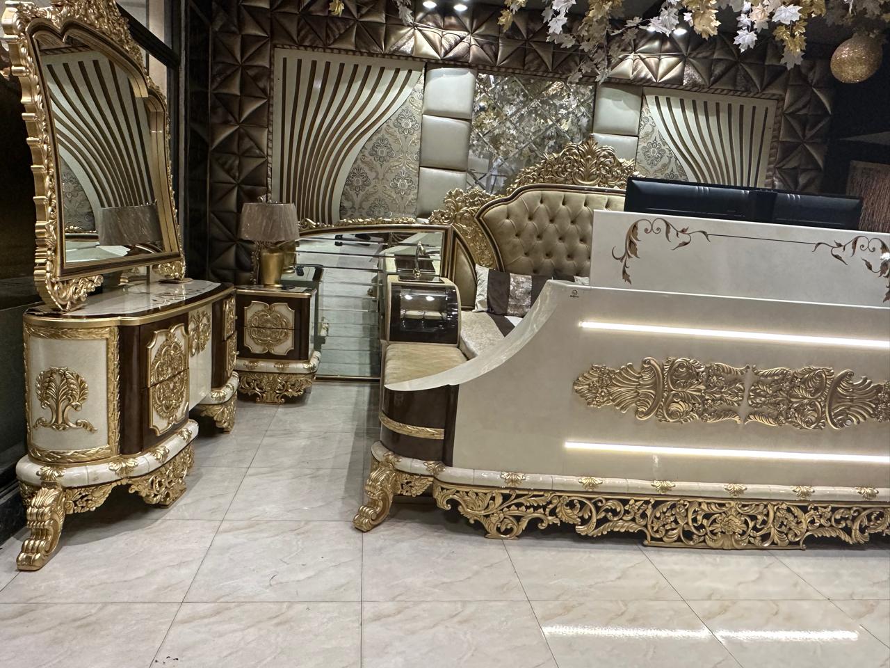 Opulent Royal Bedroom Set with Elegant Upholstery and Ornate Gold Details